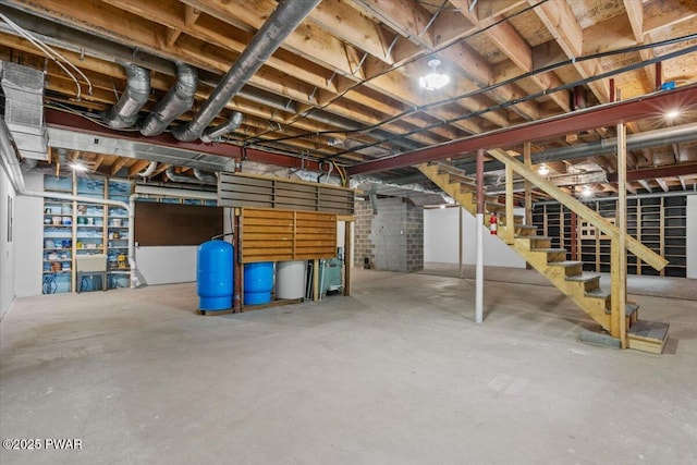 29 Hirshorn Dr, Newfoundland, PA 18445 - unfinished basement with a water pressure tank and stairs