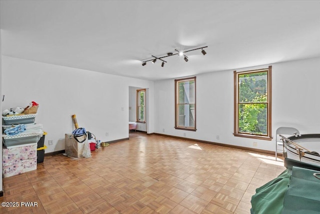 29 Hirshorn Dr, Newfoundland, PA 18445 - empty room with rail lighting and baseboards