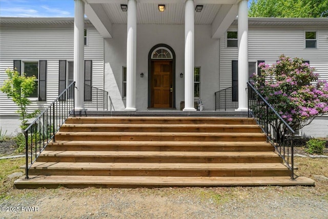 29 Hirshorn Dr, Newfoundland, PA 18445 - view of exterior entry with a porch and stucco siding