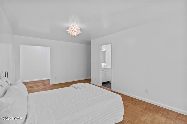 29 Hirshorn Dr, Newfoundland, PA 18445 - bedroom with baseboards and ensuite bath