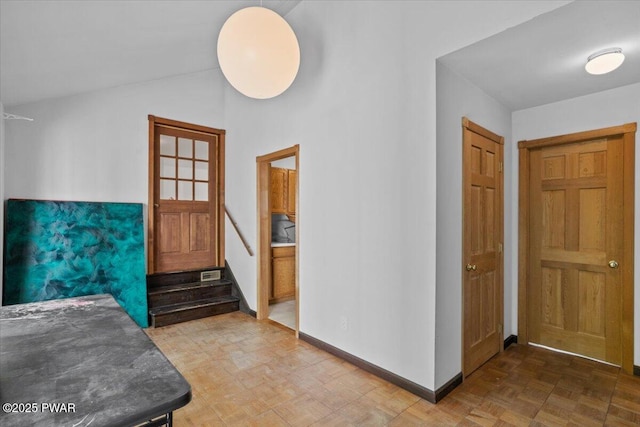 29 Hirshorn Dr, Newfoundland, PA 18445 - entryway featuring baseboards and vaulted ceiling