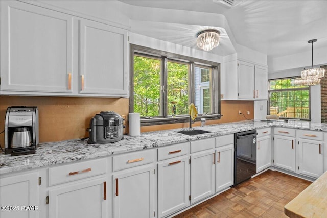29 Hirshorn Dr, Newfoundland, PA 18445 - kitchen with dishwasher, a chandelier, a sink, white cabinets, and pendant lighting
