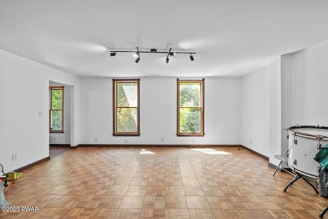 29 Hirshorn Dr, Newfoundland, PA 18445 - spare room featuring rail lighting and baseboards