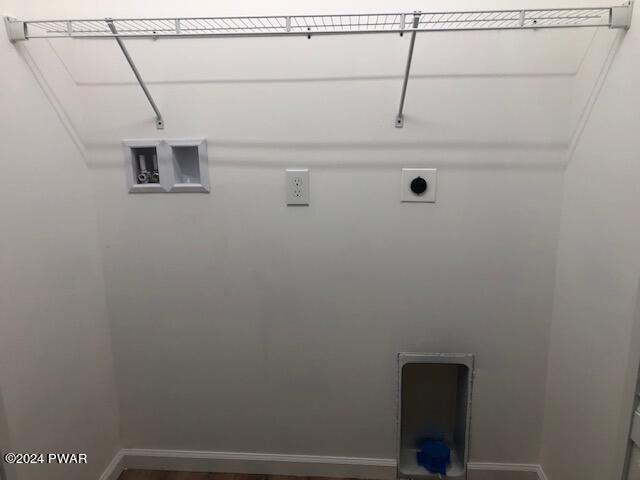 clothes washing area with hookup for a washing machine and hookup for an electric dryer