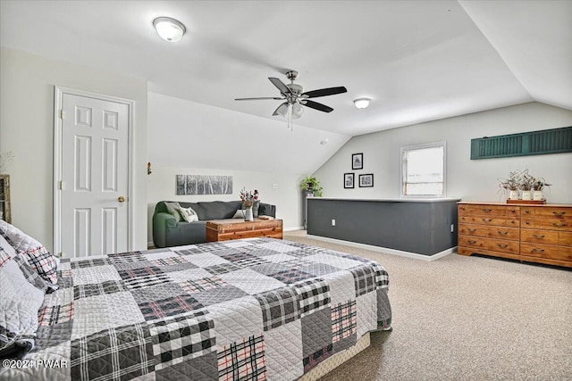 bedroom with carpet, ceiling fan, and lofted ceiling