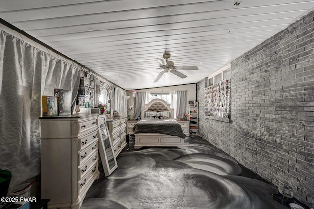 bedroom featuring brick wall