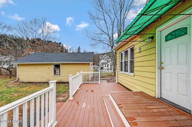 deck featuring an outbuilding