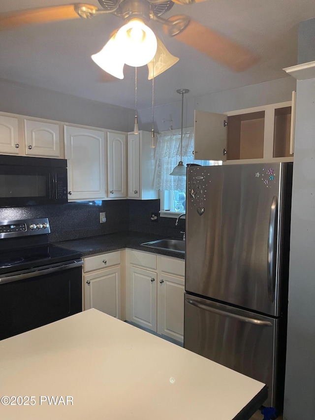 110 Gold Key Rd, Milford, PA 18337 - kitchen featuring black appliances, white cabinets, ceiling fan, and dark countertops