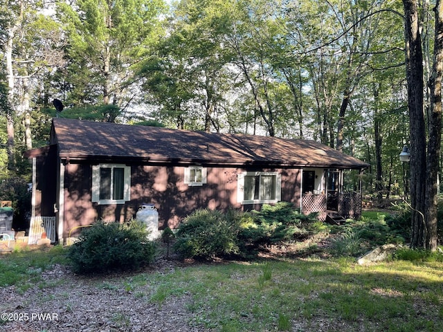 110 Gold Key Rd, Milford, PA 18337 - view of side of home featuring roof with shingles
