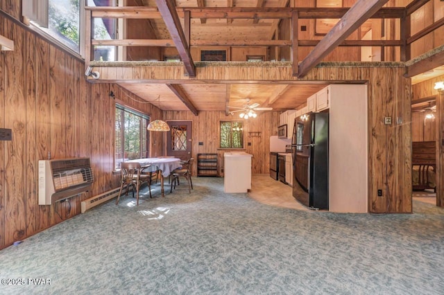 77 Brookfield Rd, Lake Ariel, PA 18436 - living area with wood walls, heating unit, light carpet, a wood ceiling with exposed beams, and a ceiling fan