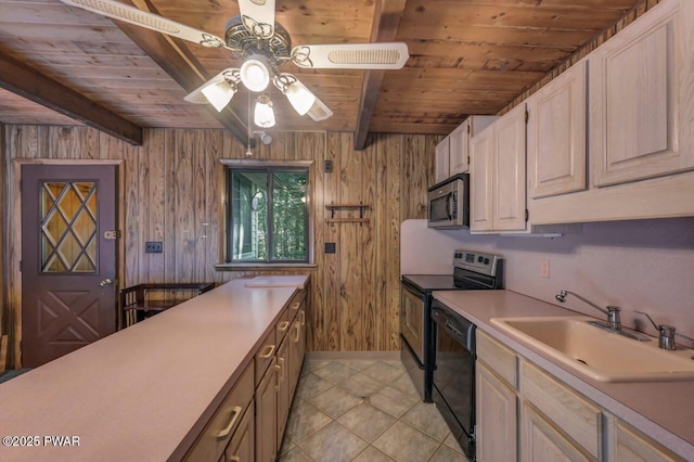 77 Brookfield Rd, Lake Ariel, PA 18436 - kitchen featuring stainless steel appliances, a wooden ceiling with exposed beams, light countertops, wooden walls, and a ceiling fan