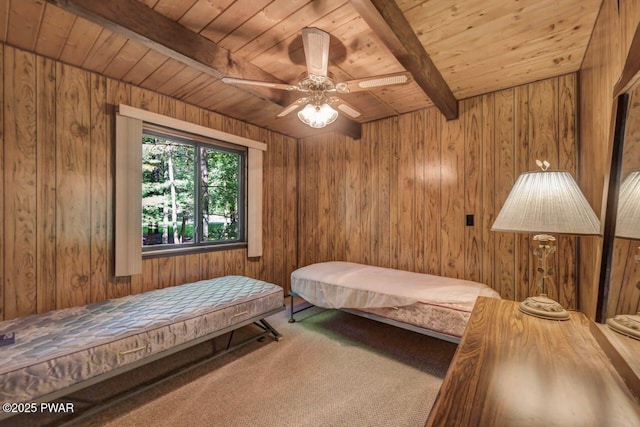 77 Brookfield Rd, Lake Ariel, PA 18436 - carpeted bedroom with a wood ceiling with exposed beams and wood walls
