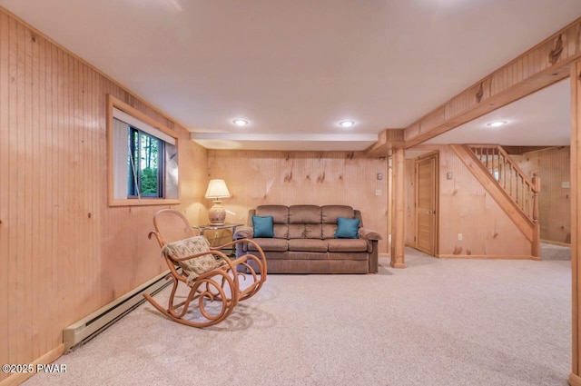 77 Brookfield Rd, Lake Ariel, PA 18436 - living area featuring a baseboard heating unit, wooden walls, stairs, carpet flooring, and recessed lighting