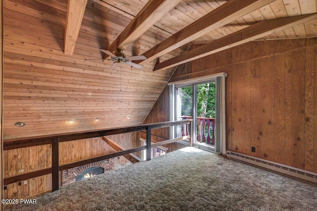 77 Brookfield Rd, Lake Ariel, PA 18436 - carpeted empty room featuring a baseboard heating unit, wood ceiling, wooden walls, and a ceiling fan