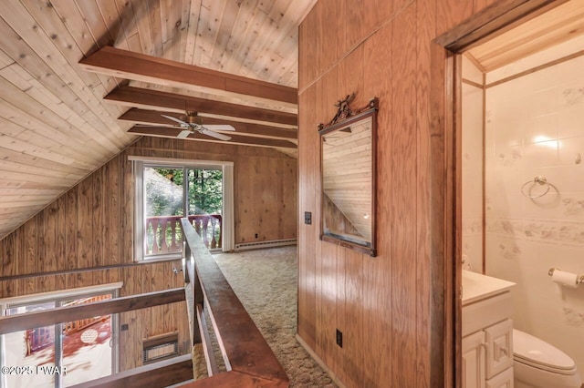 77 Brookfield Rd, Lake Ariel, PA 18436 - additional living space with carpet, a baseboard heating unit, wood ceiling, ceiling fan, and wooden walls