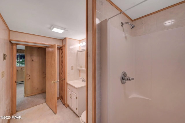 77 Brookfield Rd, Lake Ariel, PA 18436 - full bathroom featuring a shower, vanity, a baseboard heating unit, and crown molding