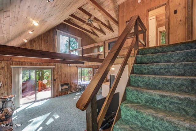 77 Brookfield Rd, Lake Ariel, PA 18436 - stairs featuring wood walls, heating unit, high vaulted ceiling, a wooden ceiling with exposed beams, and carpet floors