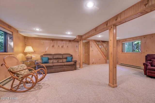 77 Brookfield Rd, Lake Ariel, PA 18436 - living area featuring a baseboard heating unit, wooden walls, carpet flooring, stairs, and recessed lighting