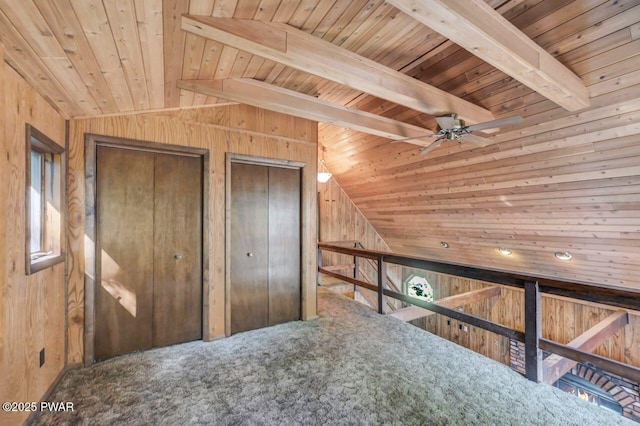 77 Brookfield Rd, Lake Ariel, PA 18436 - hall featuring wood ceiling, lofted ceiling, wood walls, and carpet flooring