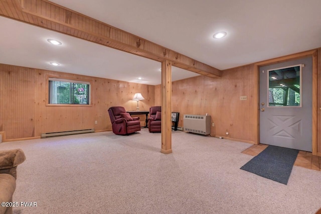 77 Brookfield Rd, Lake Ariel, PA 18436 - below grade area featuring a baseboard radiator, heating unit, carpet floors, wood walls, and recessed lighting