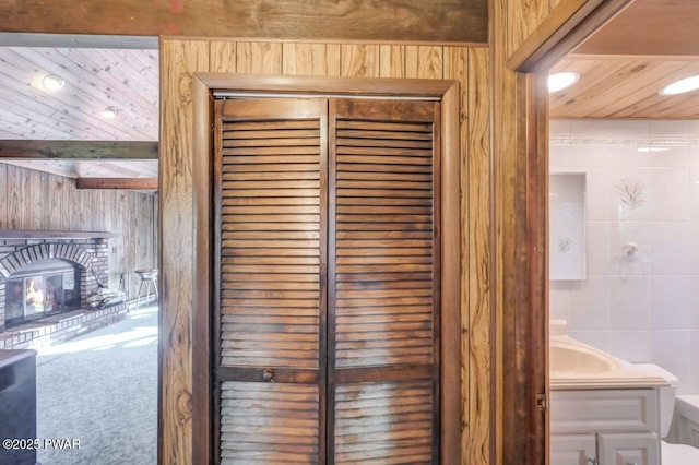 77 Brookfield Rd, Lake Ariel, PA 18436 - detailed view of tile walls, carpet flooring, and wooden walls