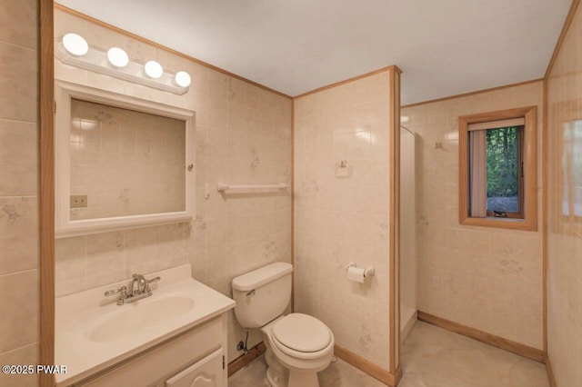 77 Brookfield Rd, Lake Ariel, PA 18436 - full bathroom with vanity, a shower stall, ornamental molding, and tile walls