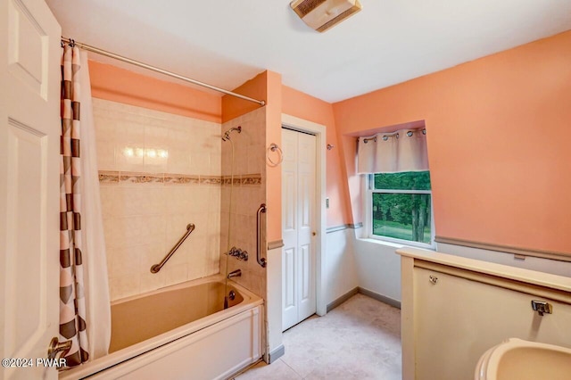 bathroom featuring shower / bathtub combination with curtain