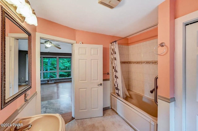 bathroom with ceiling fan and shower / tub combo