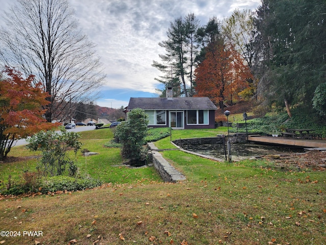 view of yard with a sunroom