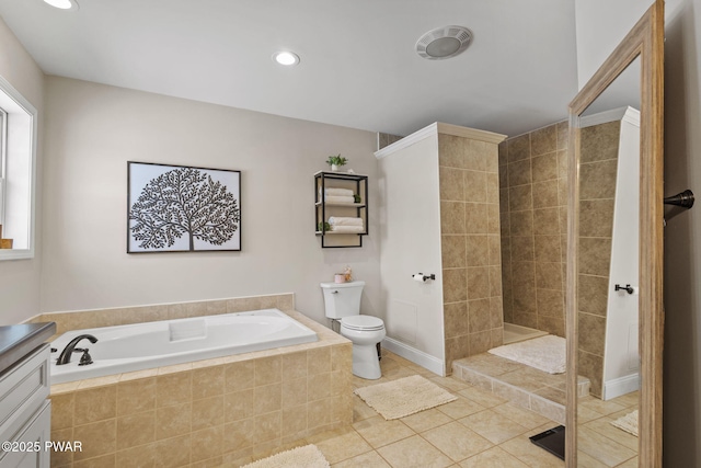 bathroom with tile patterned flooring, shower with separate bathtub, and toilet