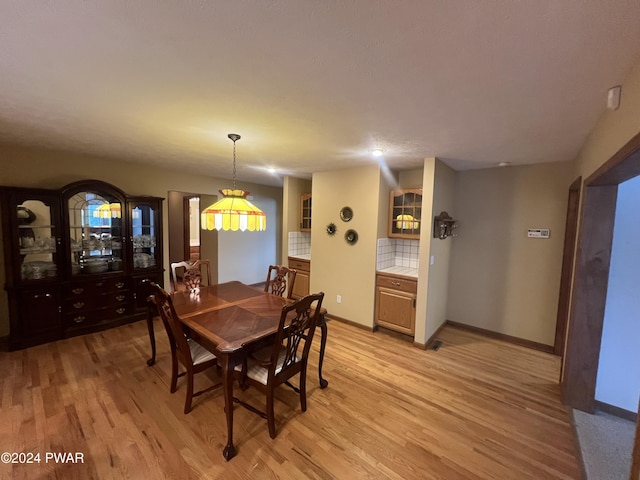 dining room featuring light wood-type flooring