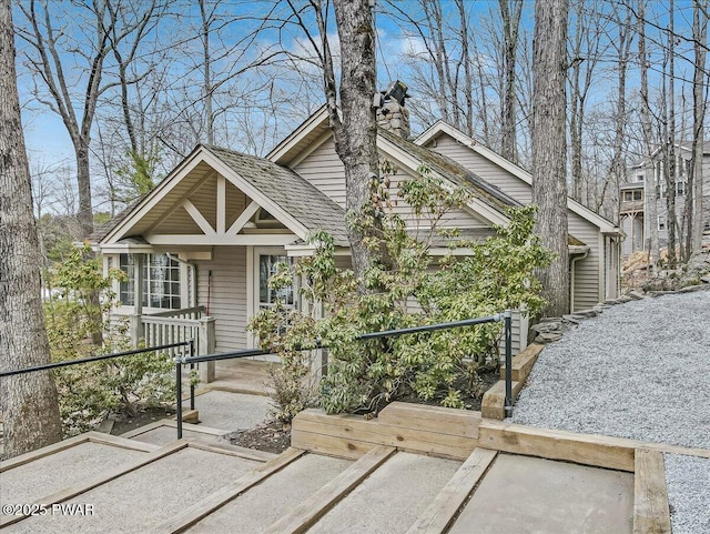 view of front of property featuring a chimney