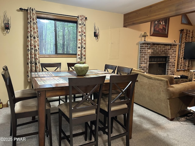 1024 Pitt Rd, Newfoundland, PA 18445 - dining room featuring carpet flooring and a brick fireplace