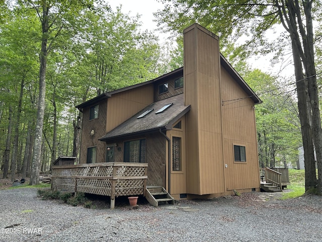 1024 Pitt Rd, Newfoundland, PA 18445 - rear view of property with a chimney and a deck