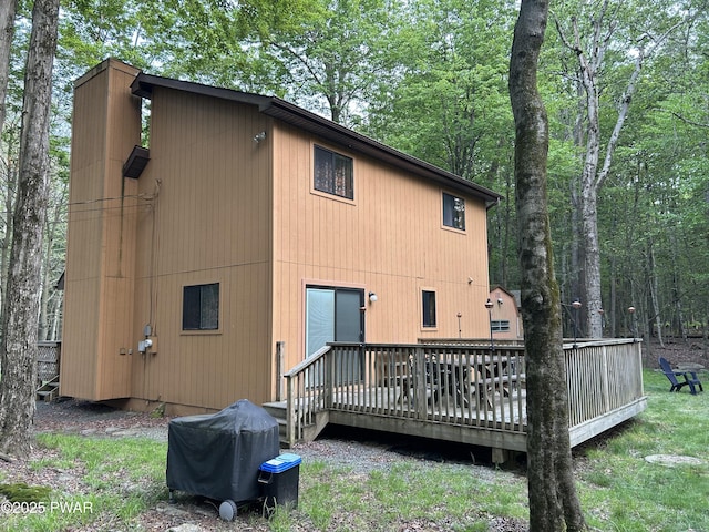 1024 Pitt Rd, Newfoundland, PA 18445 - rear view of property with a wooden deck