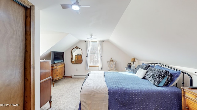 carpeted bedroom with vaulted ceiling, a baseboard heating unit, and ceiling fan