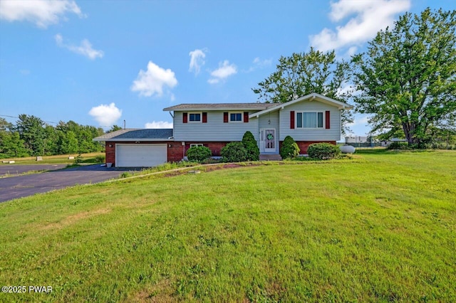 1528 Mount Cobb Rd, Jefferson Township, PA 18436 - split foyer home with brick siding, driveway, a front lawn, and a garage
