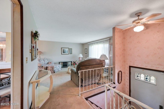 1528 Mount Cobb Rd, Jefferson Township, PA 18436 - carpeted living area with ceiling fan and a textured ceiling