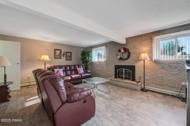 1528 Mount Cobb Rd, Jefferson Township, PA 18436 - living area with wood finished floors, a fireplace, a baseboard radiator, and beam ceiling
