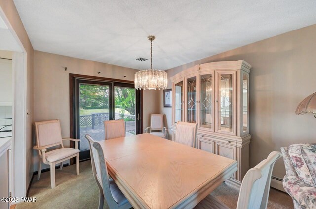 1528 Mount Cobb Rd, Jefferson Township, PA 18436 - dining room with light colored carpet, a chandelier, and a baseboard radiator
