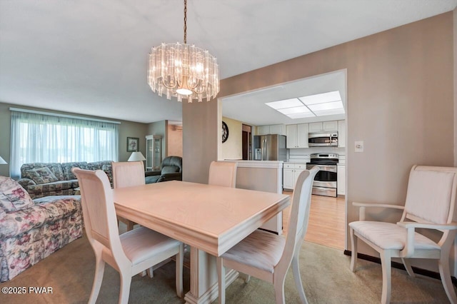 1528 Mount Cobb Rd, Jefferson Township, PA 18436 - dining area with a chandelier and light colored carpet