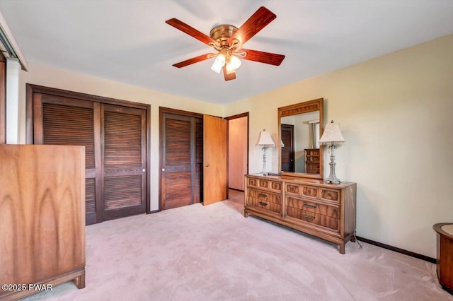 1528 Mount Cobb Rd, Jefferson Township, PA 18436 - bedroom featuring carpet floors, two closets, and a ceiling fan