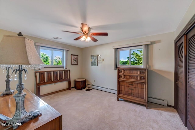 1528 Mount Cobb Rd, Jefferson Township, PA 18436 - living area featuring healthy amount of natural light, light carpet, ceiling fan, and a baseboard heating unit