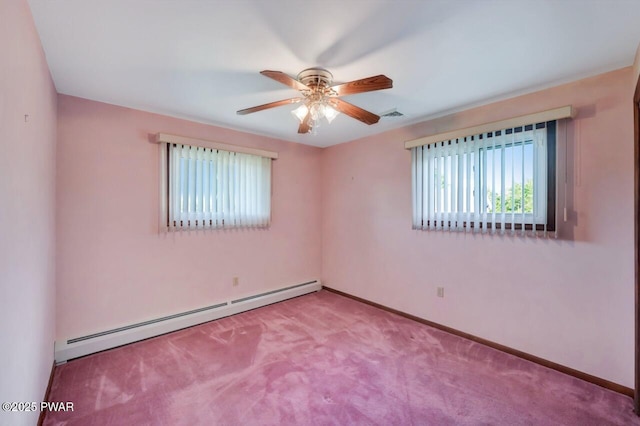 1528 Mount Cobb Rd, Jefferson Township, PA 18436 - carpeted empty room featuring a baseboard heating unit and a ceiling fan