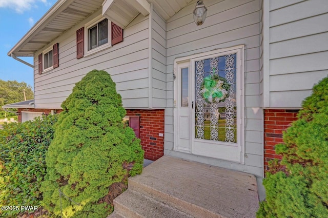 1528 Mount Cobb Rd, Jefferson Township, PA 18436 - view of exterior entry featuring brick siding