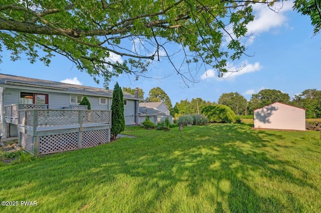 1528 Mount Cobb Rd, Jefferson Township, PA 18436 - view of grassy yard featuring a deck and an outdoor structure