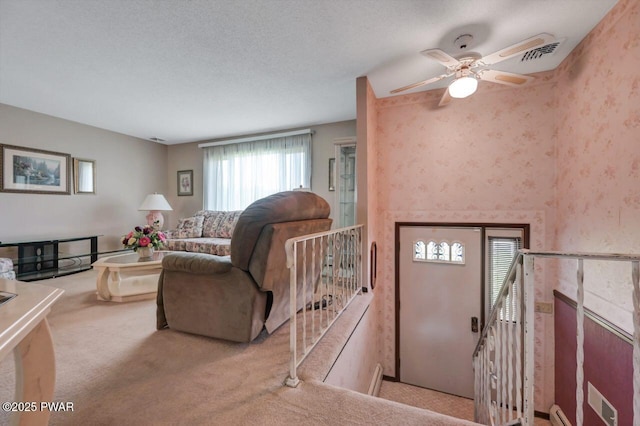 1528 Mount Cobb Rd, Jefferson Township, PA 18436 - carpeted living room featuring ceiling fan and a fireplace
