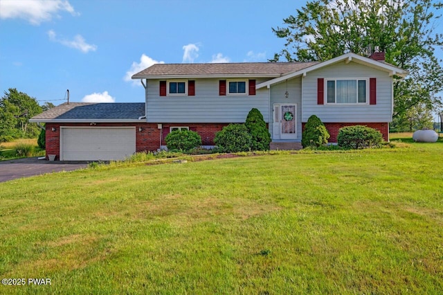 1528 Mount Cobb Rd, Jefferson Township, PA 18436 - split foyer home featuring brick siding, a garage, asphalt driveway, a front yard, and a chimney