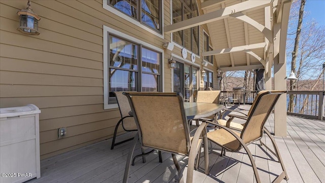 deck featuring outdoor dining space