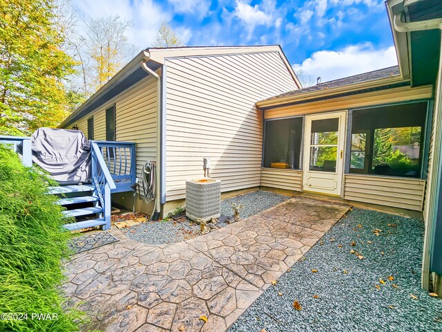 view of property exterior featuring central AC unit